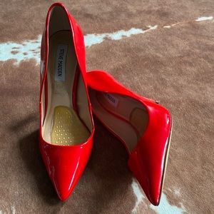 Red patent leather Steve Madden pumps